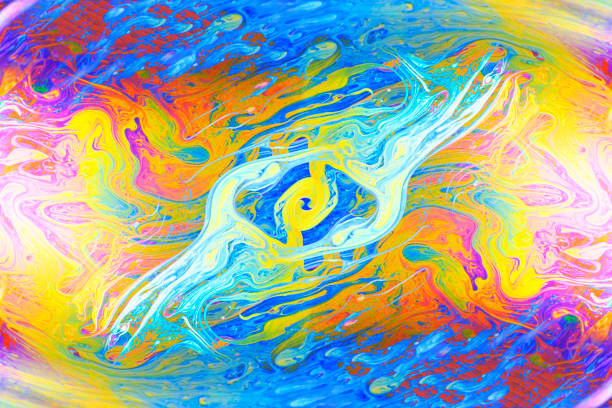 Extreme close-up of rainbow colored soap bubble abstract background.
