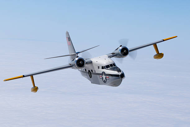 istock Top view of a HU-16 Albatross (post WWII flying boat) over cloud layers 2203157354