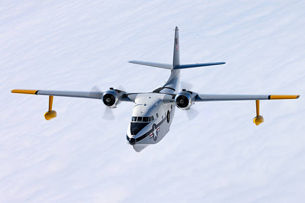 Frontal view of a HU-16 Albatross (post WWII flying boat) over cloud layers