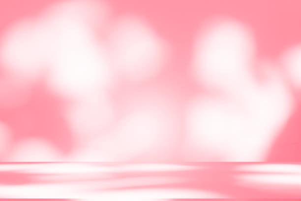 istock Wall interior background, studio, and backdrops show products. with shadow from window color white and pink light. background for text insertion and presentation of product 2203162270