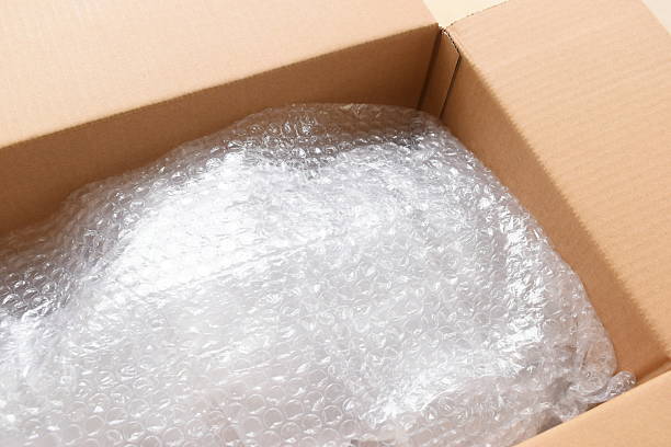 istock shockproof in brown paper box, recycle material 2203163980