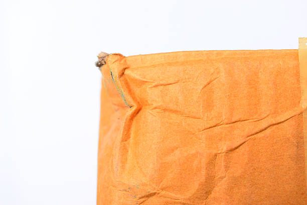 wrinkle brown cardboard box texture isolated on white background