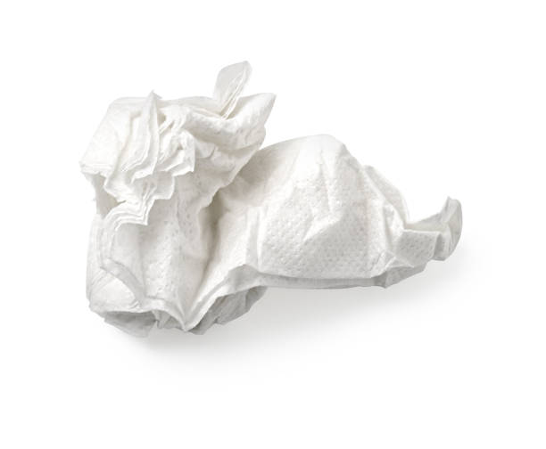 istock Crumpled white paper napkin on white background 2203174876