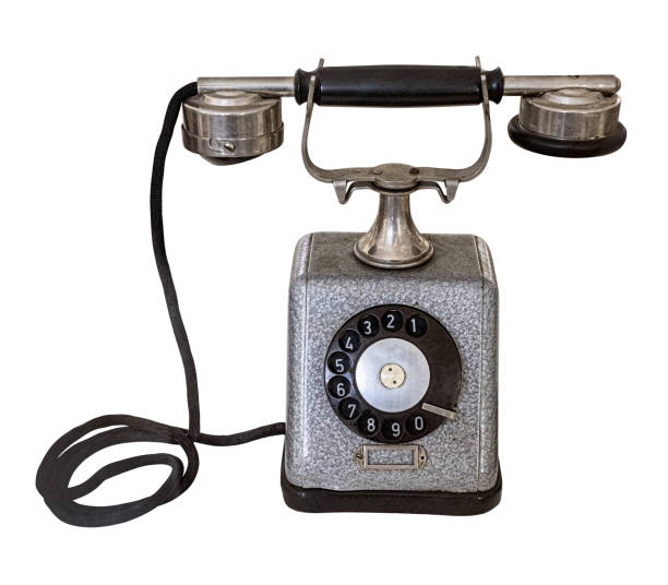 istock Old rotary phone connecting to the past on white background 2203174895