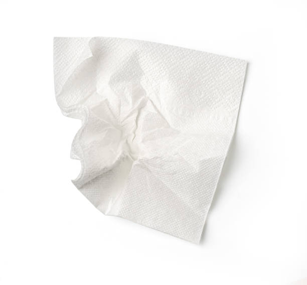 istock Crumpled white paper napkin on white background 2203174911