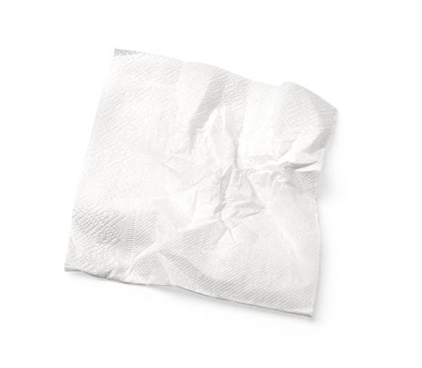 istock Crumpled white paper napkin on white background 2203174925