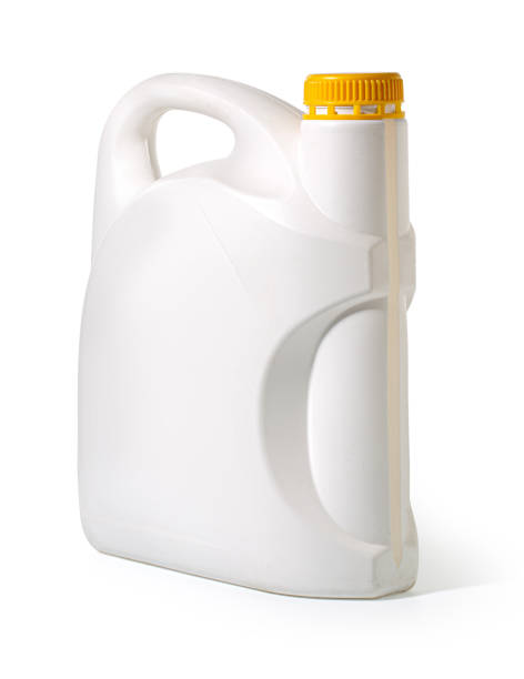 istock White plastic gallon bottle with yellow cap isolated on white background 2203174940