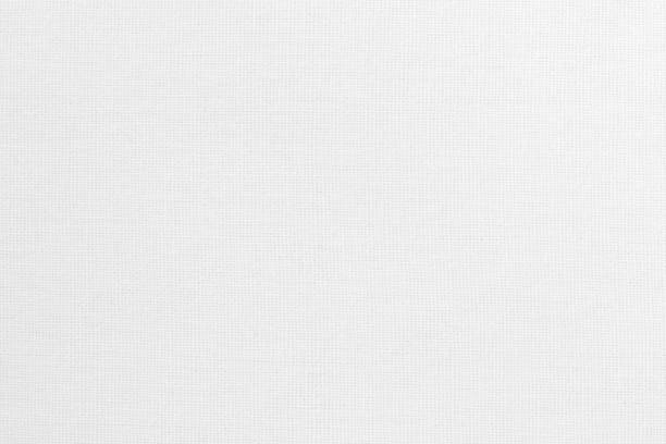 istock White cotton fabric texture background, seamless pattern of natural textile. 2203177958