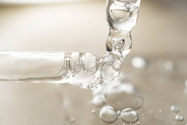 istock samples serum tests glass pipettes with drops of serum on a light beige background 2203180392