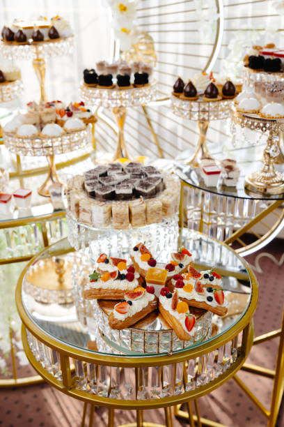 istock Delicious macarons and pastries decorating a luxurious candy bar buffet 2203181540