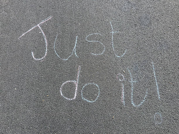 istock A motivational message on the sidewalk in chalk 2203184677