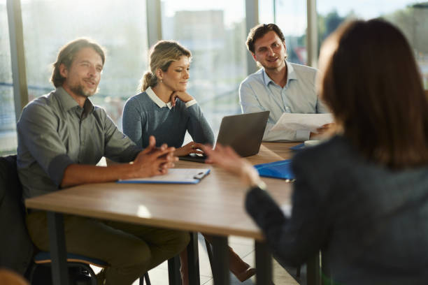 istock Human resource team having a job interview with a candidate in the office. 2203185143