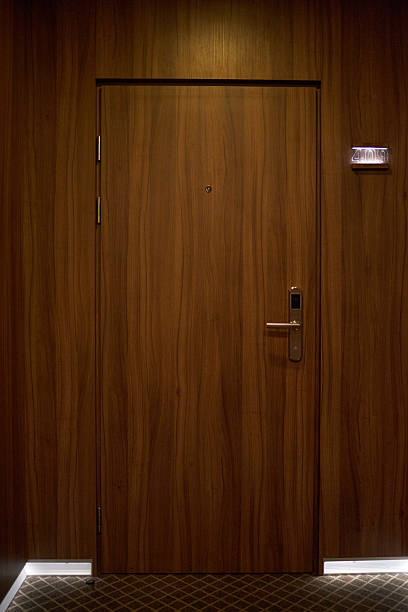 istock Closed Wooden Door with Modern Handle 2203186963