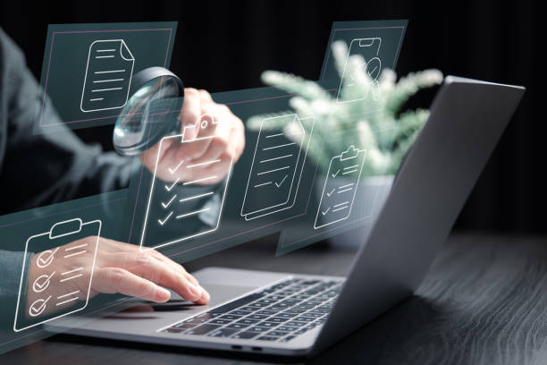 istock Quality Control and Auditing. Highlights the importance of inspections, validation, and accuracy in business operations, using technology to streamline the process. 2203188077