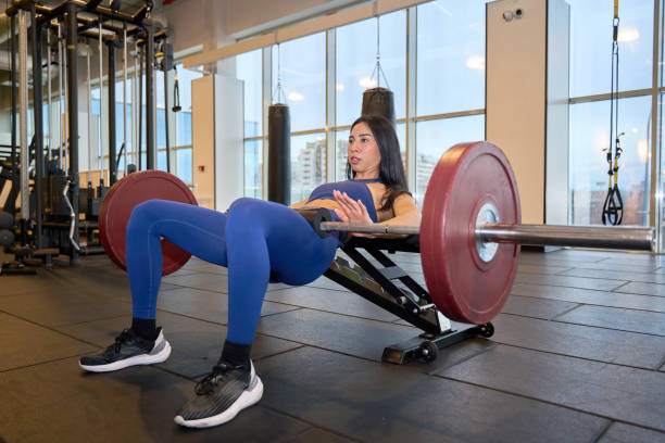 Hip Thrust Stock Photos, Pictures & Royalty-Free Images - iStock | Hip exercise, Exercise bench, Dumbbells