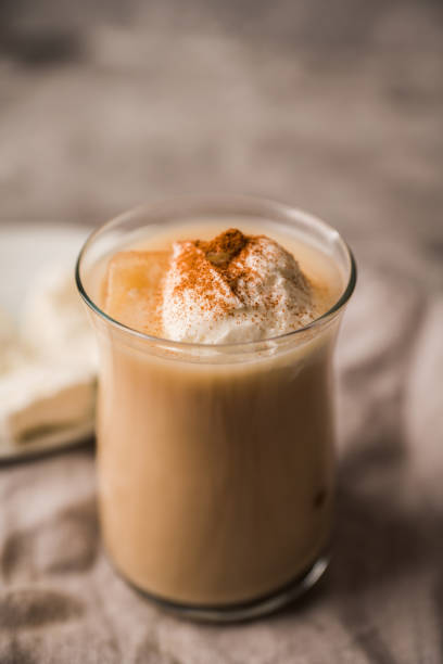istock Coffee with ice cream and cinnamon in glass cup 2203189788