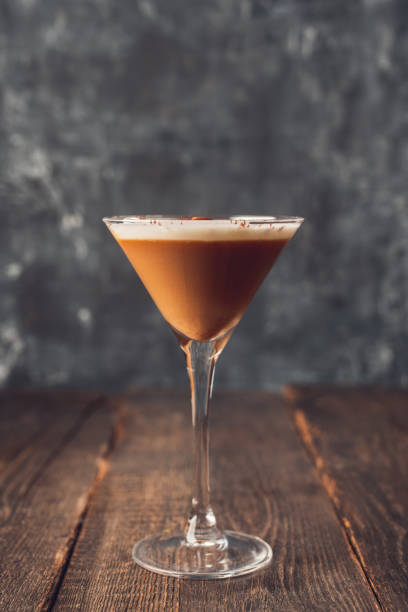 istock Coffee liqueur based cocktail in martini glass on the rustic background 2203189872