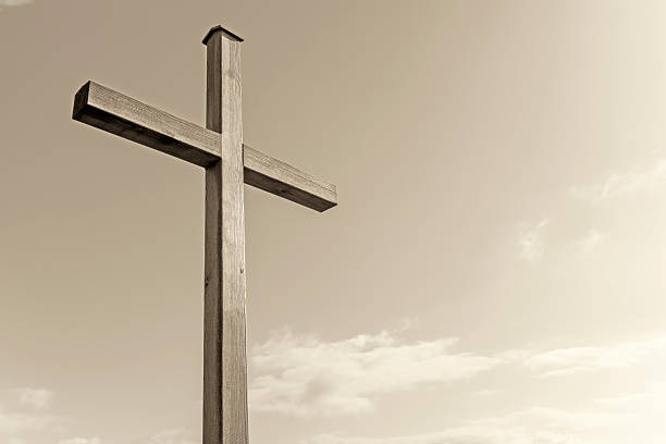 Wooden cross against sky, duotone retro style