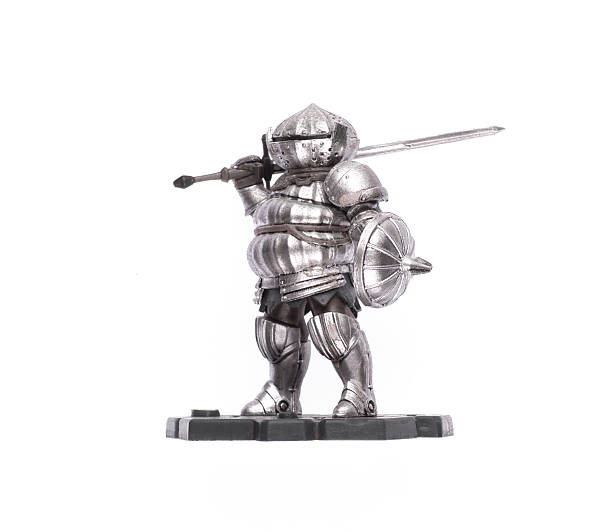 istock metal knight figurine isolated on white background 2203191171
