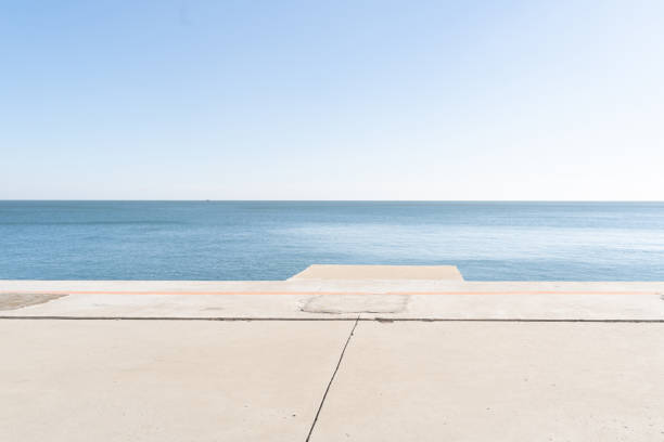 istock empty concrete ground near coastline for copy space. 2203195955