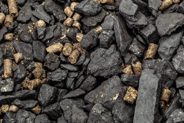 istock Coal and biomass pellet 2203196374