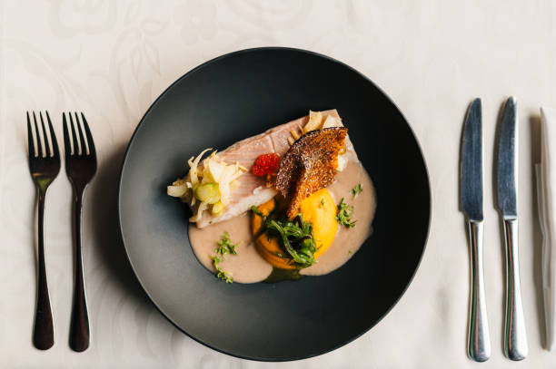 istock Fancy food with a Trout, pumpkin puree and seaweed 2203196384