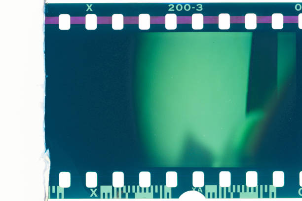 Blank grained and scratched film strip texture background