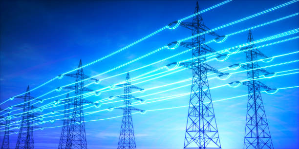 istock Electricity transmission towers with glowing wires 2203196499