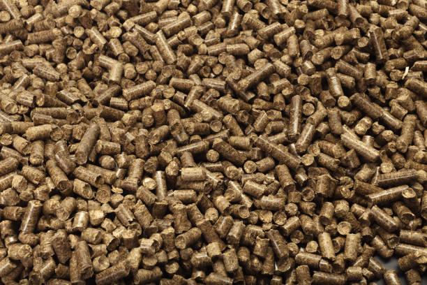 istock Wood pellets in the background. 2203197701