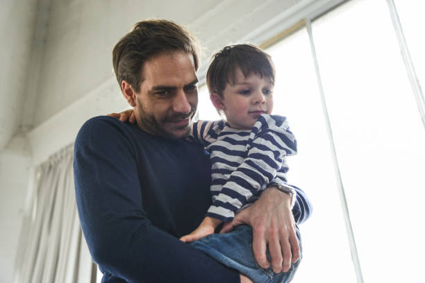 istock father and son have fun together 2203200081