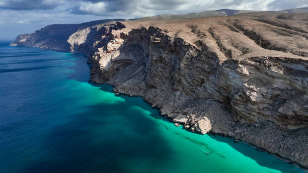 istock Discover Socotra Islands stunning coastal cliffs and clear blue waters 2203200590