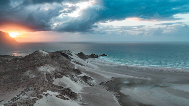 istock Discover unique Socotra landscape at sunset featuring dramatic cliffs and serene waters 2203201394