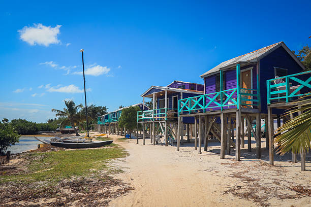 istock Colorful beachfront accommodations in Caye Caulker Belize under bright blue skies 2203202523