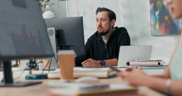 istock A customer service employee, acting as an insurance adjuster, leads a video call, waving in greeting, explaining problem resolution, and accepting the client's claim. 2203206476