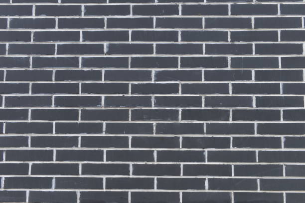 istock Brick and stone walls, red leaves 2203211062
