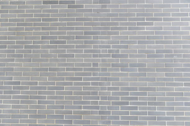 istock Brick and stone walls, red leaves 2203211065