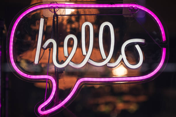 istock Glowing neon sign with word hello 2203211737