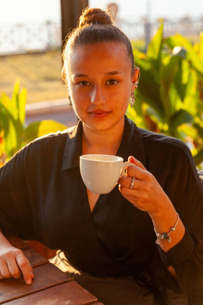 istock Portrait of young women drinking coffee 2203216510