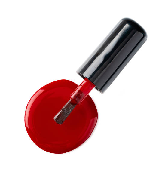 istock Close up of a nail polish puddle over white background 2203216531
