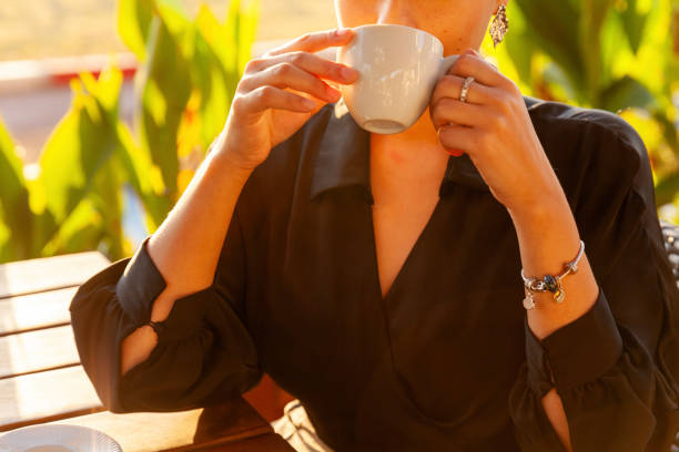 Portrait of young women drinking coffee