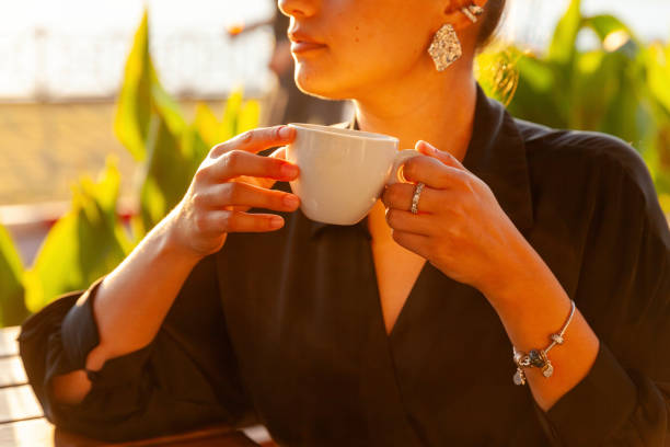 Portrait of young women drinking coffee