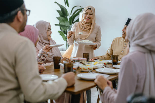 istock Together in Celebration: A Family Feast During Hari Raya 2203218500