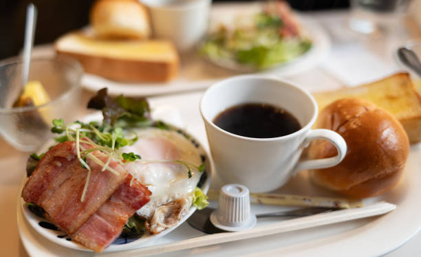 istock Enjoy a snack and coffee at a coffee shop 2203218721