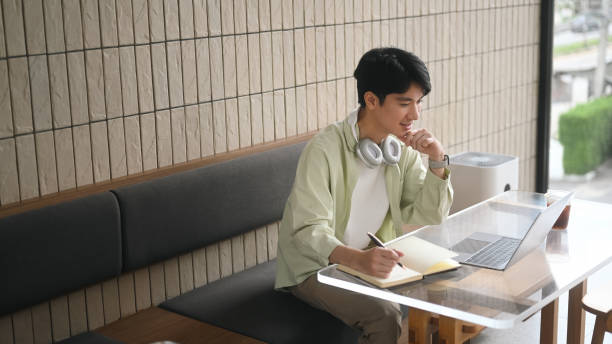 istock Productive Workspace Vibes with A Handsome Man Working On Laptop 2203220543