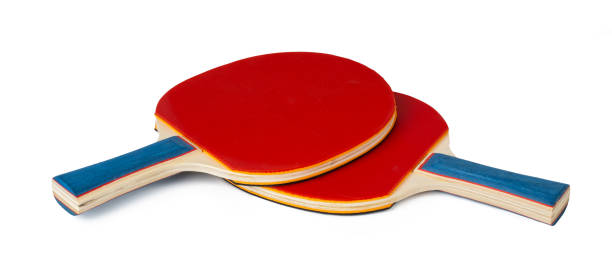 istock Two ping pong rackets isolated on white background 2203222924