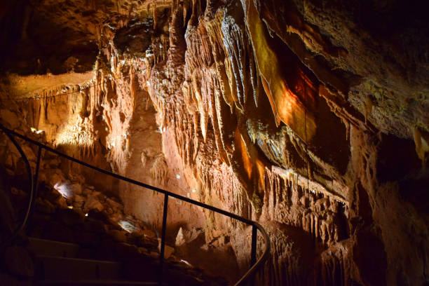 istock Underground limestone cave, stalactites, stalagmites, and geological formations 2203224940