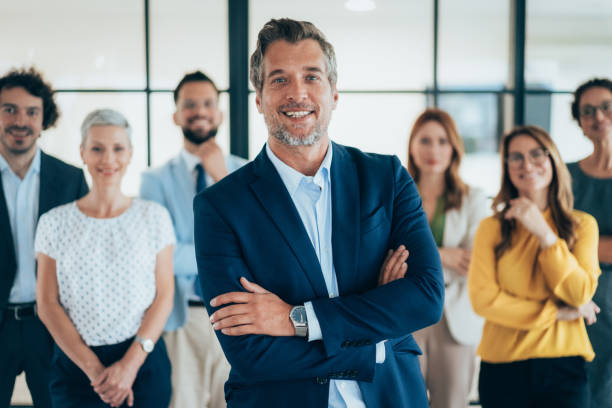 istock Confident businessman and his team 2203226887