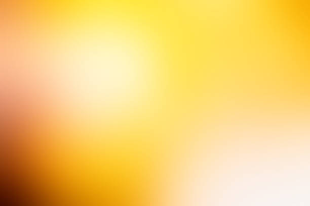istock Luxury of light yellow and golden smooth blurred gradient background has a little abstract light. modern of sunlight shadow backdrop for graphic design, Empty wallpaper template for products 2203228440
