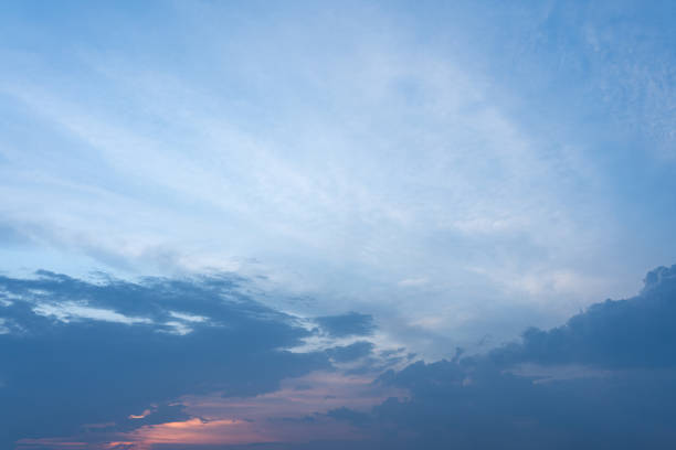 istock Serene Twilight Sky Blue Hour Cloudscape with Pastel Sunset Hues 2203228566