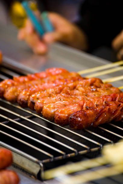 istock Traditional snack, fragrant grilled sausage 2203229790
